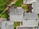 Aerial view of townhome complex featuring trees, patios, and well-maintained grounds at 50 Mount Vernon Cir, Atlanta, GA 30338