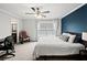 Bedroom featuring natural light, carpeted floors, and a striking accent wall at 50 Mount Vernon Cir, Atlanta, GA 30338