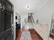 Bright entryway featuring hardwood floors, staircase, and stylish decor at 50 Mount Vernon Cir, Atlanta, GA 30338