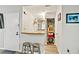 A charming bar area with stools, a counter, open shelving, and convenient access to outside at 830 Bonnie Glen Se Dr, Marietta, GA 30067