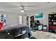 Relaxing bedroom featuring a bed, desk, and ample storage space, ideal for comfortable living at 830 Bonnie Glen Se Dr, Marietta, GA 30067