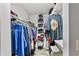 Spacious walk-in closet with ample storage, shelving, and hanging space for clothes and accessories at 830 Bonnie Glen Se Dr, Marietta, GA 30067