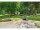 Backyard shed with a firepit at 2661 Fleur De Lis Pl, Atlanta, GA 30360
