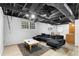 Finished basement area featuring modern furnishings and a sleek, open-concept design at 2661 Fleur De Lis Pl, Atlanta, GA 30360