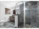 Bathroom with large glass shower and dark vanity at 2661 Fleur De Lis Pl, Atlanta, GA 30360