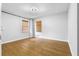 Bedroom with hardwood floors and two windows at 2661 Fleur De Lis Pl, Atlanta, GA 30360