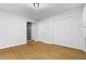 Bedroom with hardwood floors, a walk in shower, and a closet at 2661 Fleur De Lis Pl, Atlanta, GA 30360