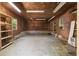 Utility garage interior featuring shelves and work space at 2661 Fleur De Lis Pl, Atlanta, GA 30360
