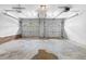 Spacious two-car garage featuring double doors and ample room for parking at 2661 Fleur De Lis Pl, Atlanta, GA 30360