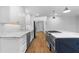 Kitchen area showcasing marble countertops, white cabinets, and stainless steel appliances at 2661 Fleur De Lis Pl, Atlanta, GA 30360