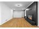 Spacious living area with fireplace and hardwood floors at 2661 Fleur De Lis Pl, Atlanta, GA 30360