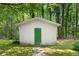 Exterior of a shed with a green door at 2661 Fleur De Lis Pl, Atlanta, GA 30360