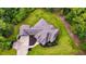 An aerial view of the home set amongst lush greenery at 7269 Tyree Rd, Winston, GA 30187