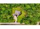 The property features lush greenery, mature trees and a long driveway at 7269 Tyree Rd, Winston, GA 30187