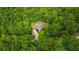 Aerial view of a lush, wooded property with mature trees at 7269 Tyree Rd, Winston, GA 30187