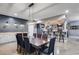 Spacious basement with dining area, wet bar, and sleek lighting at 7269 Tyree Rd, Winston, GA 30187
