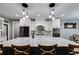 Kitchen with a large island, stone countertops, and stainless appliances at 7269 Tyree Rd, Winston, GA 30187
