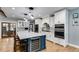 Kitchen featuring stone countertops, an eat-in island, and stainless steel appliances at 7269 Tyree Rd, Winston, GA 30187