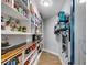 Spacious pantry features extensive shelving and hardwood floors, offering ample storage at 7269 Tyree Rd, Winston, GA 30187