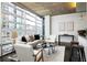 Bright open-plan living space with floor to ceiling windows and modern furnishings at 923 Peachtree Ne St # 1238, Atlanta, GA 30309