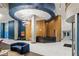Spacious lobby with modern lighting, unique architectural design, and comfortable lounge seating at 923 Peachtree Ne St # 1238, Atlanta, GA 30309