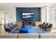 Modern lounge area featuring comfortable seating, a large television, and a stylish design at 923 Peachtree Ne St # 1238, Atlanta, GA 30309