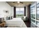 Cozy bedroom with city views and elegant furniture at 923 Peachtree Ne St # 1238, Atlanta, GA 30309