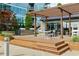 Outdoor dining area featuring a grill, dining table, and chairs, perfect for entertaining or relaxation at 923 Peachtree Ne St # 1238, Atlanta, GA 30309