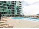Enjoy the outdoors in this pool surrounded by modern lounge chairs and beautiful views of the city skyline at 923 Peachtree Ne St # 1238, Atlanta, GA 30309