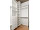 Custom walk-in closet provides ample storage with built-in shelving and drawers at 923 Peachtree Ne St # 1238, Atlanta, GA 30309