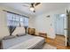 Bright bedroom featuring hardwood floors, neutral walls, and ample natural light at 1284 Piedmont Ne Ave # 12, Atlanta, GA 30309