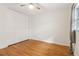 Bedroom featuring hardwood floors and ample closet space near a window at 1284 Piedmont Ne Ave # 12, Atlanta, GA 30309