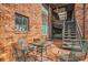 Charming brick courtyard with wrought iron furniture, ideal for outdoor relaxation and entertaining at 1284 Piedmont Ne Ave # 12, Atlanta, GA 30309