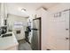 Well-lit kitchen features stainless steel appliances, white cabinetry, and modern finishes at 1284 Piedmont Ne Ave # 12, Atlanta, GA 30309