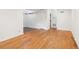 Spacious living area features hardwood floors and an open floor plan leading to a secondary space at 1284 Piedmont Ne Ave # 12, Atlanta, GA 30309