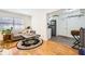 Comfortable living room with hardwood floors, sofa, area rug, and view into modern kitchen at 1284 Piedmont Ne Ave # 12, Atlanta, GA 30309