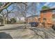 Exterior view showing building, parking lot, and mature trees providing ample shade at 1284 Piedmont Ne Ave # 12, Atlanta, GA 30309
