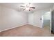 Bedroom featuring a ceiling fan and carpet at 1830 Broadway St, Decatur, GA 30035