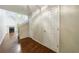 Bright entryway with hardwood floors, two-story ceiling, and a view of the living area at 1830 Broadway St, Decatur, GA 30035