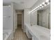 Spacious bathroom featuring double sinks, vanity with lighting, and bathtub at 2421 Elkhorn Ter, Duluth, GA 30096