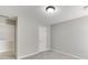 Empty bedroom with neutral paint and ceiling light fixture at 2421 Elkhorn Ter, Duluth, GA 30096