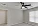 Bedroom with a ceiling fan, and a bright window at 2421 Elkhorn Ter, Duluth, GA 30096