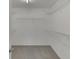 Walk-in closet with wire shelving for ample storage and gray carpet flooring at 2421 Elkhorn Ter, Duluth, GA 30096