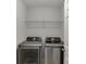 Convenient laundry room with modern washer and dryer at 2421 Elkhorn Ter, Duluth, GA 30096