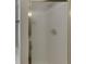 Framed glass shower door with frosted glass panel at 2421 Elkhorn Ter, Duluth, GA 30096