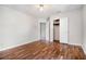 This bedroom boasts updated flooring, closet, and a ceiling fan at 3530 E Ponce De Leon Ave, Scottdale, GA 30079