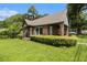 Beautiful brick home showcasing lush landscaping and inviting curb appeal at 3530 E Ponce De Leon Ave, Scottdale, GA 30079