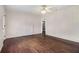 Bright living room with hardwood floors, a non-operable fireplace and white walls at 3530 E Ponce De Leon Ave, Scottdale, GA 30079