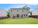 Spacious backyard with a small deck, ideal for outdoor relaxation and entertaining at 6738 Brookfield Way, Douglasville, GA 30134