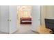 View of bedroom through double doors, showcasing a bed and bedroom furniture at 6738 Brookfield Way, Douglasville, GA 30134